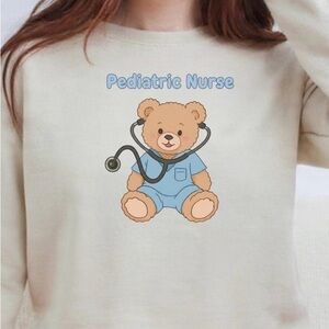 Gildan Cream Pediatric Nurse Bear Sweatshirt